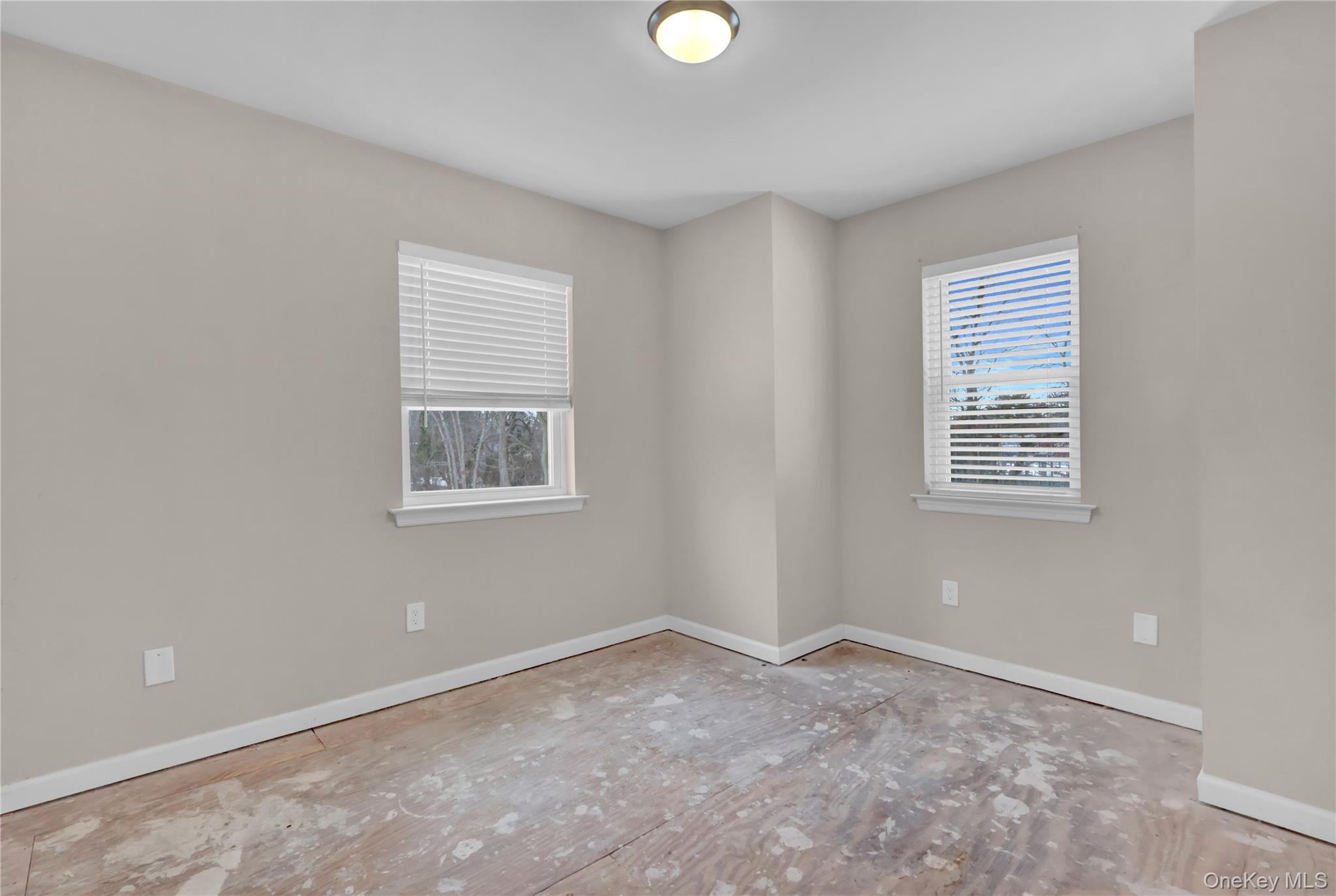 2 7th Street Center Moriches, NY 11934 - Photo 18 of 28 a view of an empty room with a window