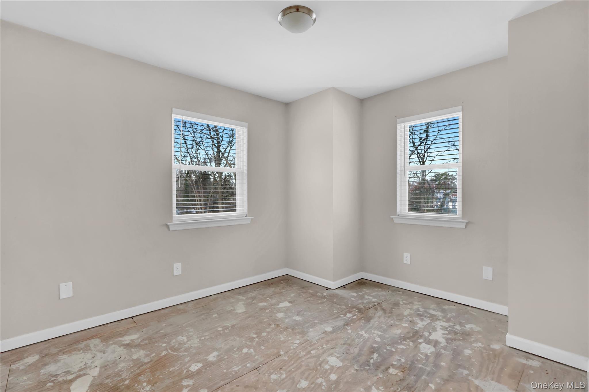 2 7th Street Center Moriches, NY 11934 - Photo 20 of 28 a view of an empty room with a window