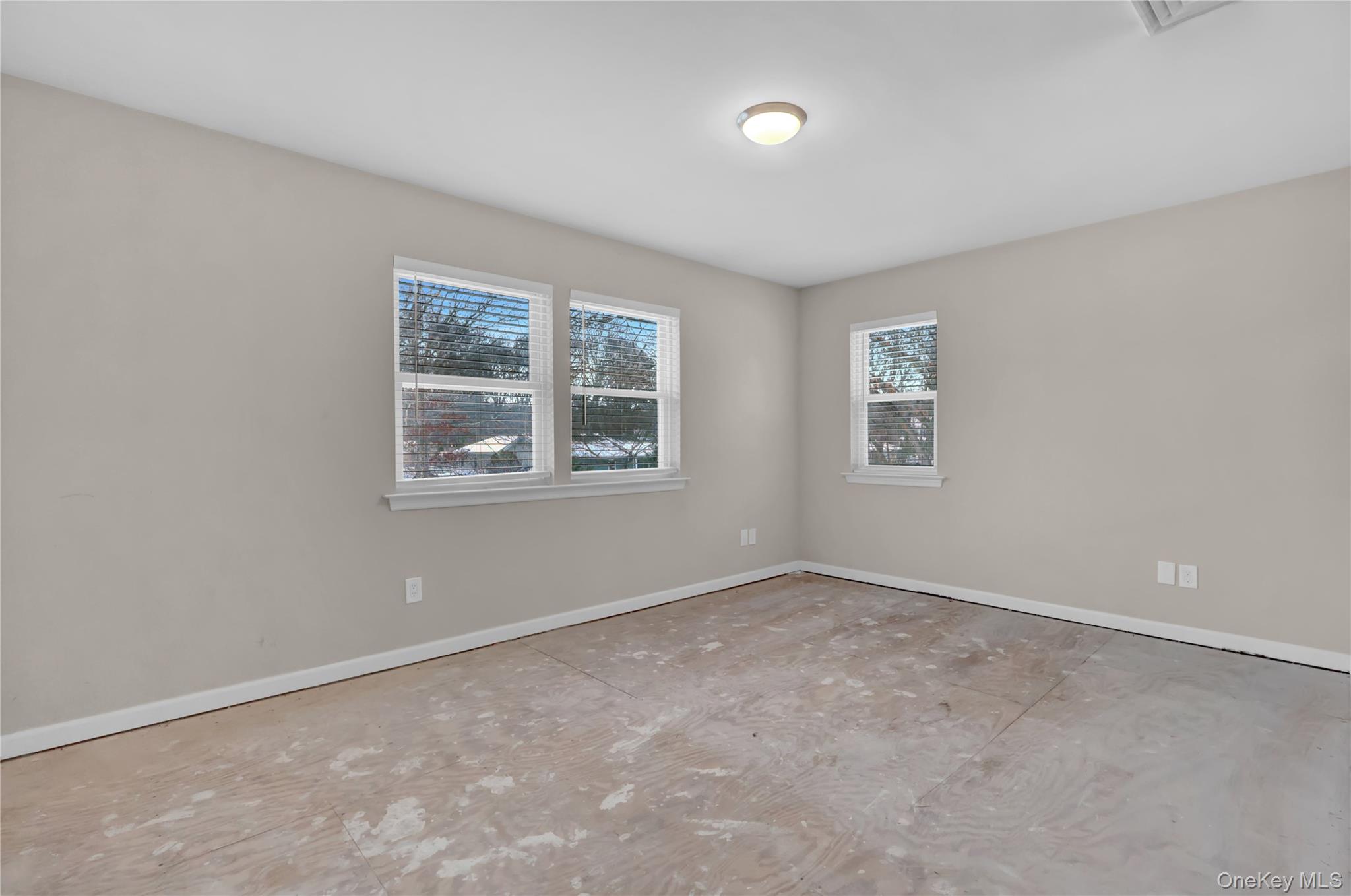 2 7th Street Center Moriches, NY 11934 - Photo 21 of 28 an empty room with windows
