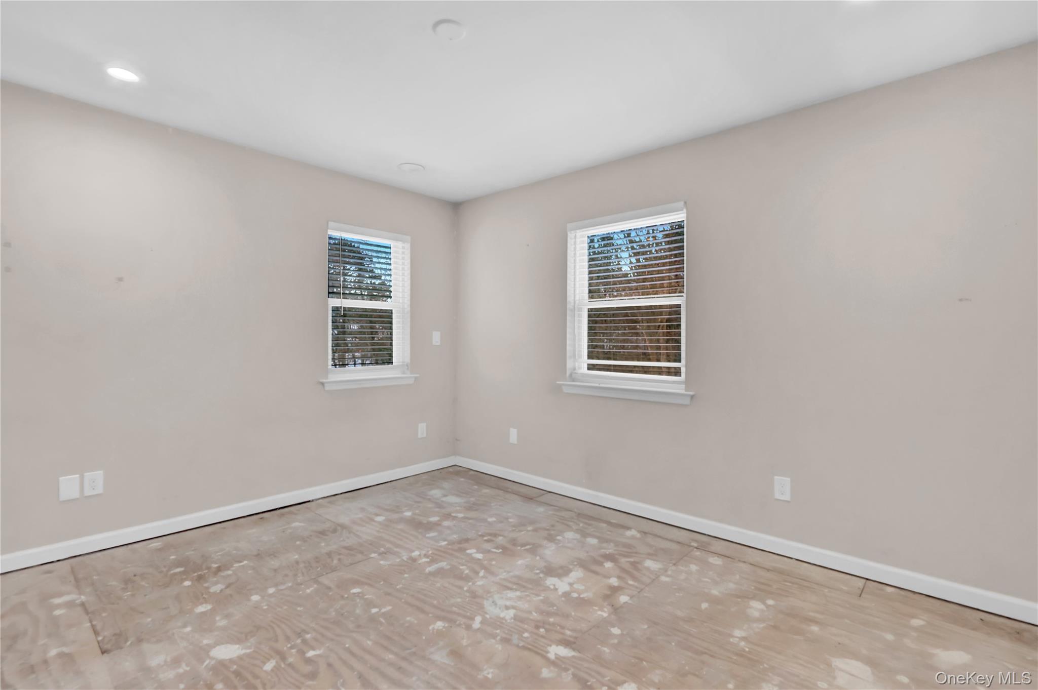 2 7th Street Center Moriches, NY 11934 - Photo 3 of 28 a view of an empty room with a window