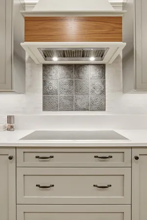a view of a kitchen with a sink and dishwasher