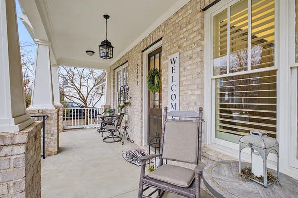 a view of a livingroom with furniture and windows