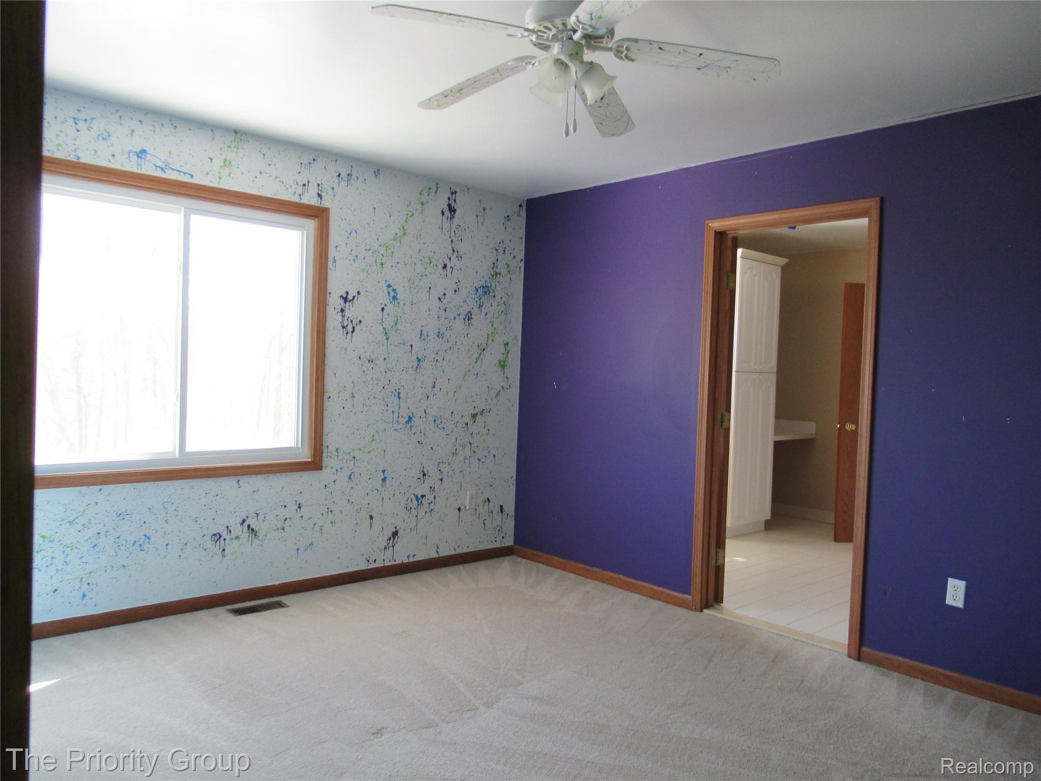 11494 Milford Road Holly, MI 48442 - Photo 21 of 39 upstairs bedroom 2.jpg