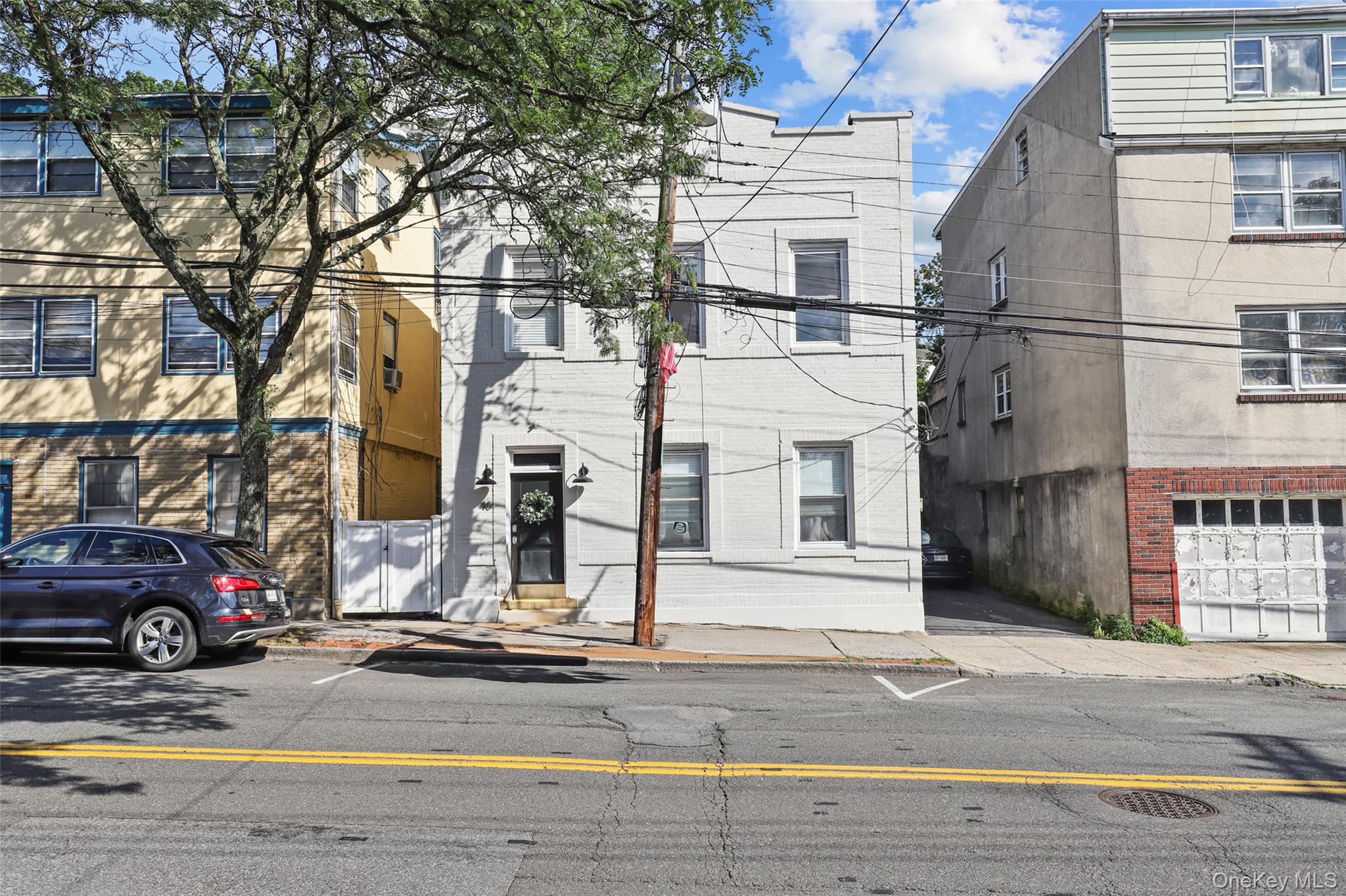40 Main Street, Unit 2 Dobbs Ferry, NY 10522 - Photo 1 of 1 a view of a street with cars on road