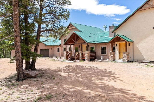 a front view of a house with wooden floor