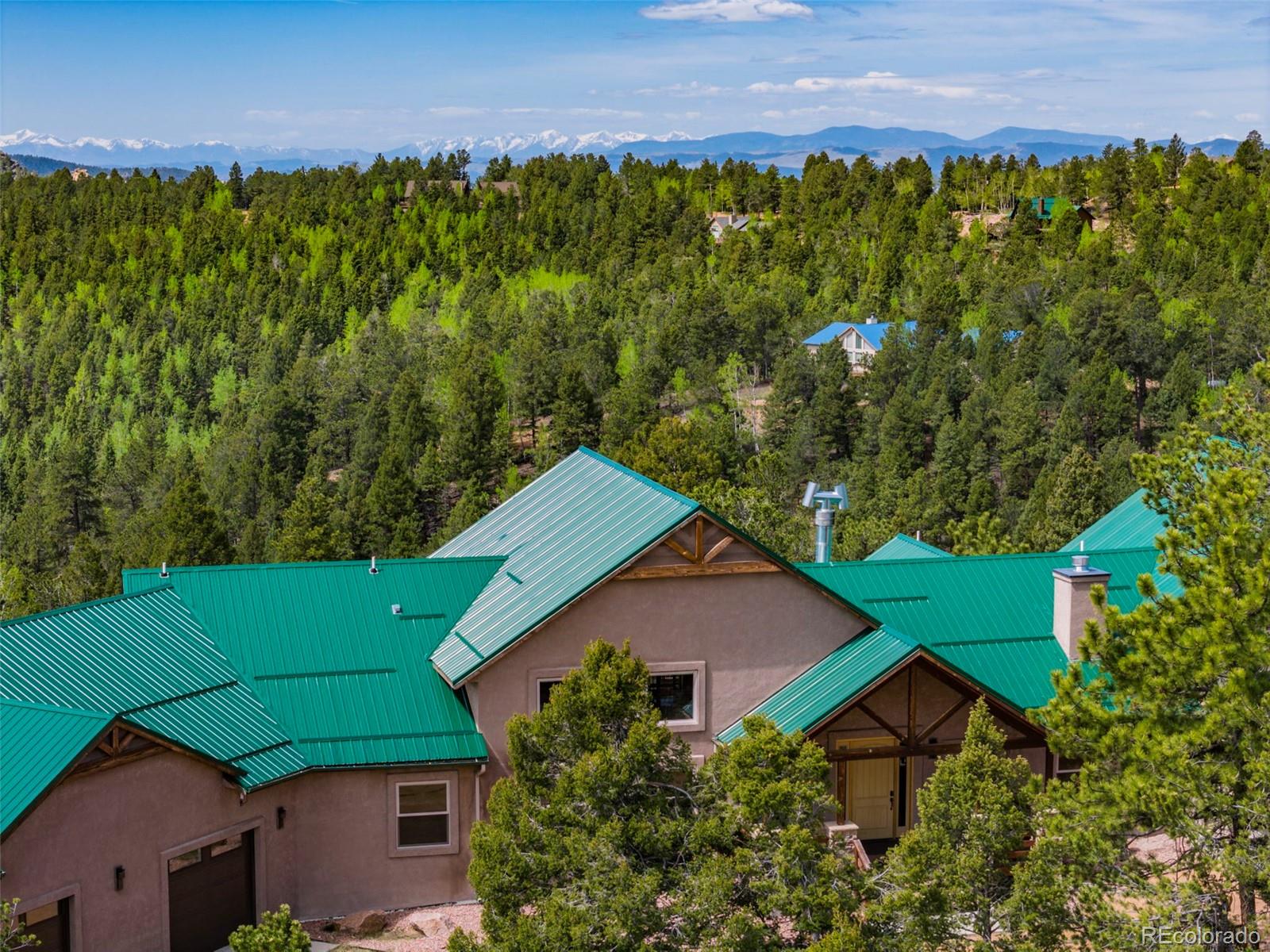 252 Running Elk Point Divide, CO 80814 - Photo 14 of 50 an aerial view of a house with a yard and lake view