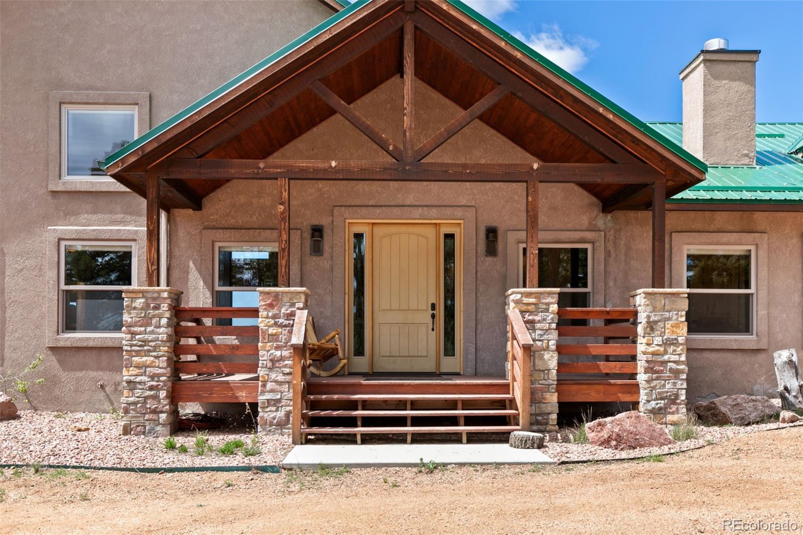 252 Running Elk Point Divide, CO 80814 - Photo 16 of 50 a front view of a house with wooden floor