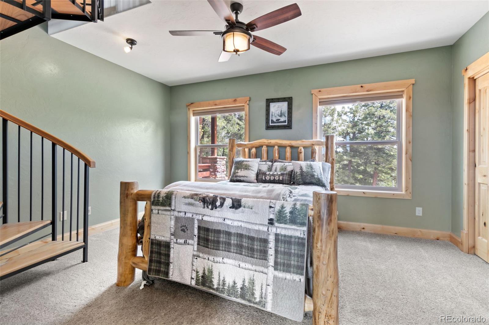 252 Running Elk Point Divide, CO 80814 - Photo 26 of 50 a bedroom with a bed and a window