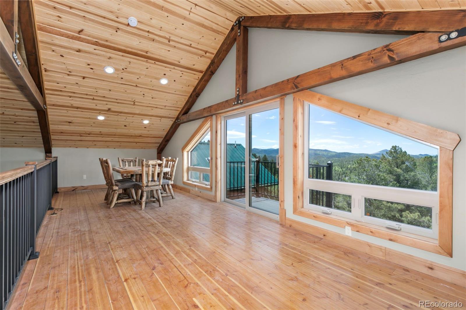 252 Running Elk Point Divide, CO 80814 - Photo 36 of 50 a sitting area with furniture and wooden deck