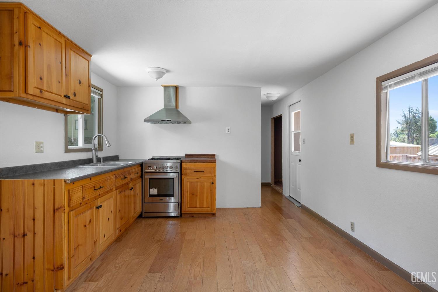 Undisclosed Address Pine Mountain Club, CA 93222 - Photo 16 of 22 a kitchen with stainless steel appliances granite countertop a stove and a sink