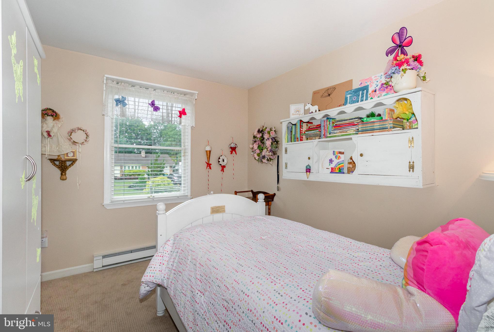 21 Cardinal Drive Carlisle, PA 17015 - Photo 14 of 33 a bedroom with a bed and a window