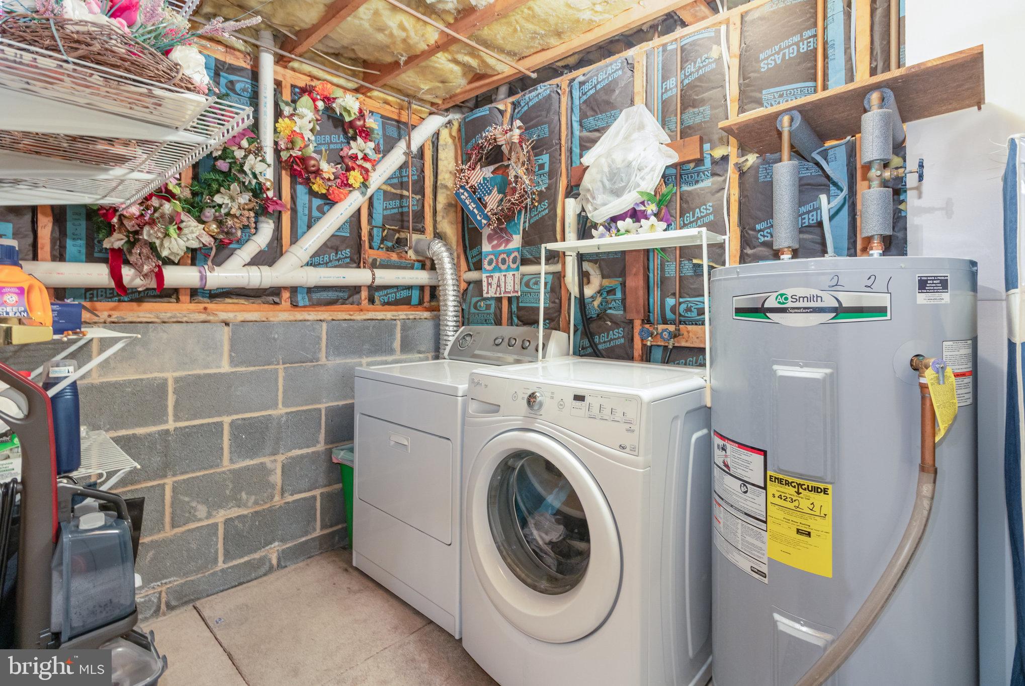 21 Cardinal Drive Carlisle, PA 17015 - Photo 21 of 33 a utility room with dryer and washer