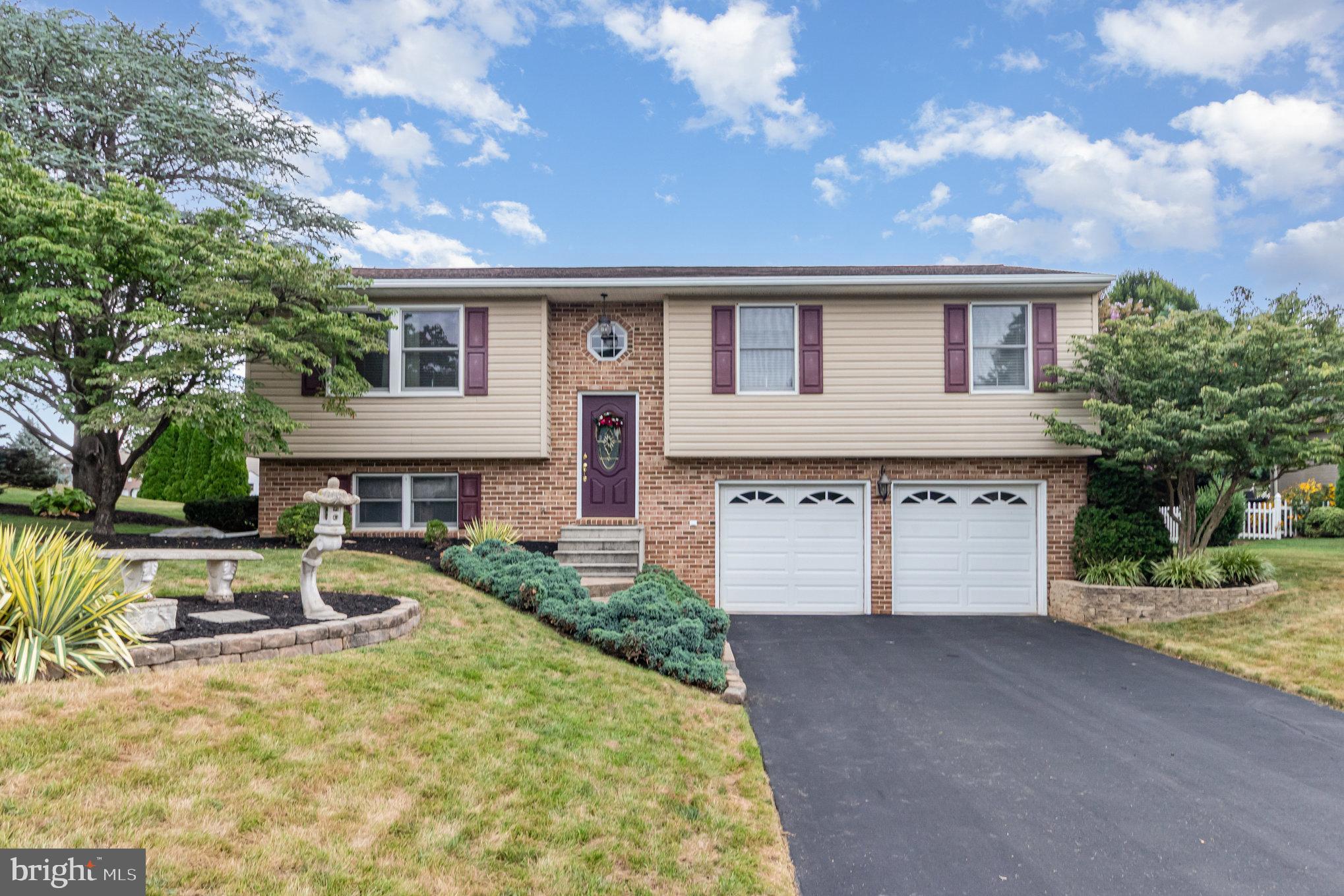 21 Cardinal Drive Carlisle, PA 17015 - Photo 23 of 33 front view of house with a yard