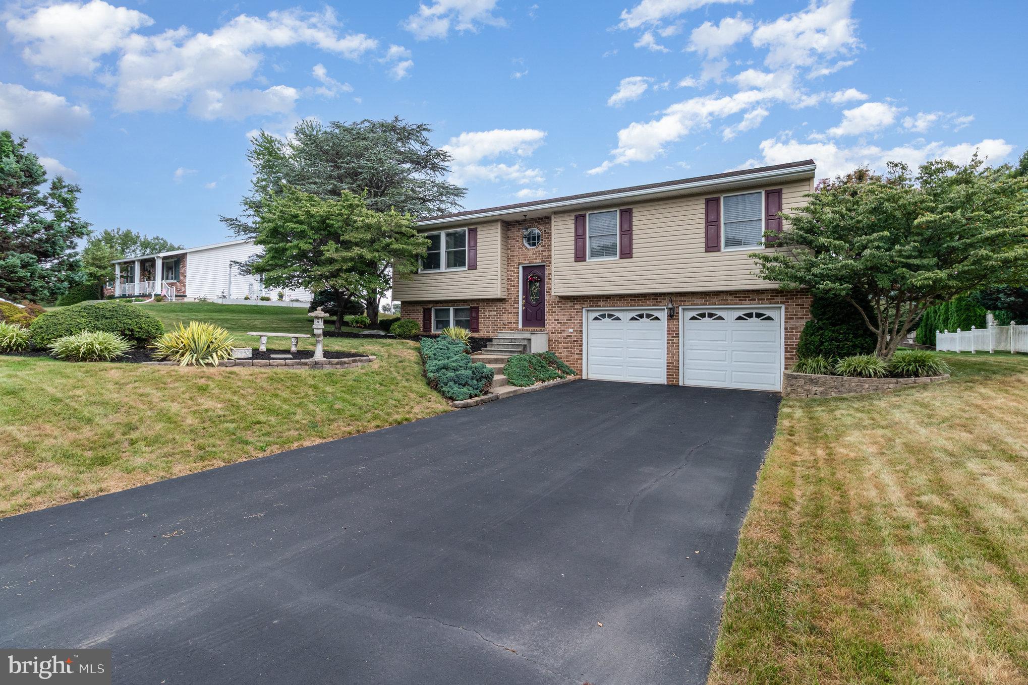 21 Cardinal Drive Carlisle, PA 17015 - Photo 24 of 33 a front view of house with yard