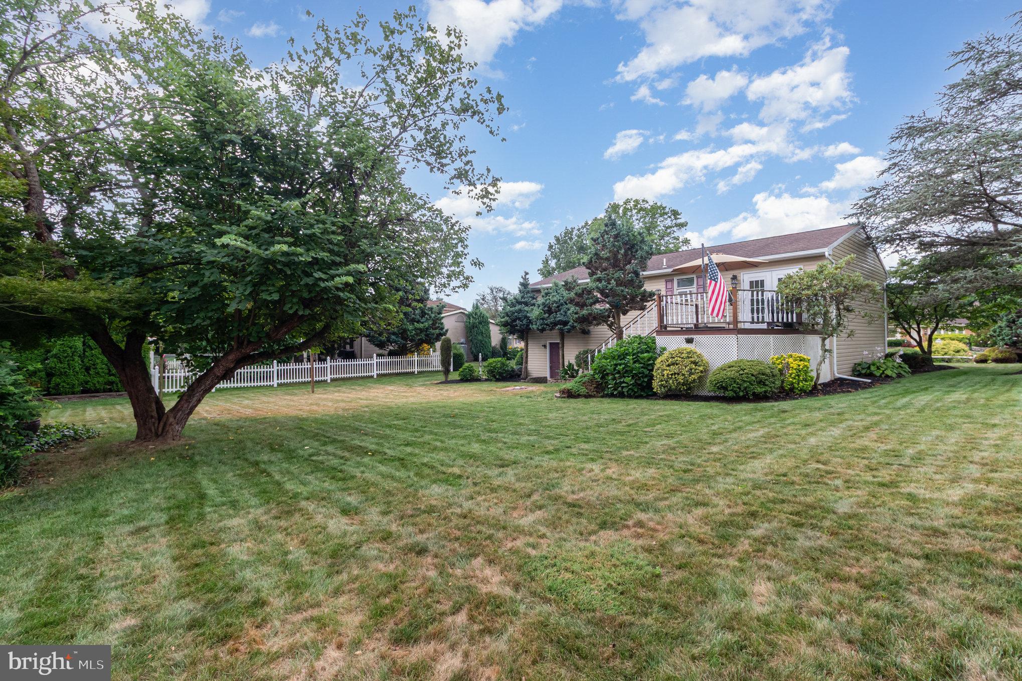 21 Cardinal Drive Carlisle, PA 17015 - Photo 28 of 33 a view of a house with a big yard and large trees