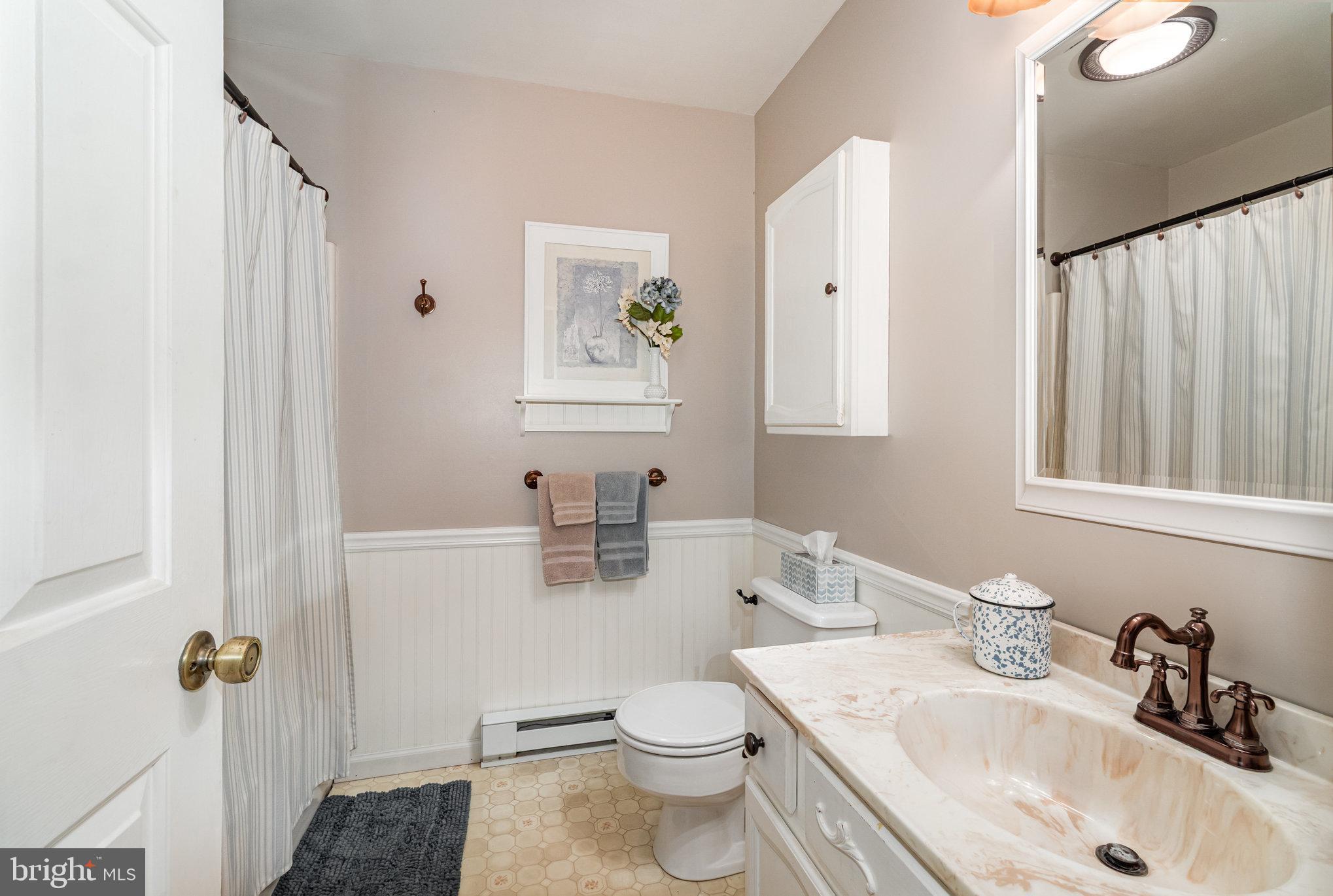 21 Cardinal Drive Carlisle, PA 17015 - Photo 9 of 33 a bathroom with a sink toilet and vanity
