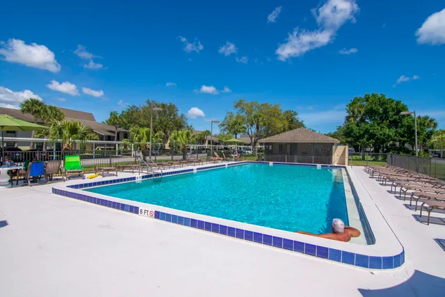a view of an outdoor space and tennis court