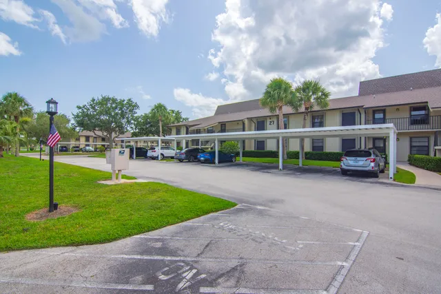 a view of a park with swings and slides