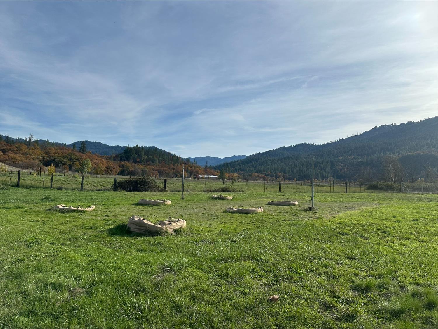 581 Garrett Road Hyampom, CA 96046 - Photo 18 of 45 a view of a lake with a mountain in the background