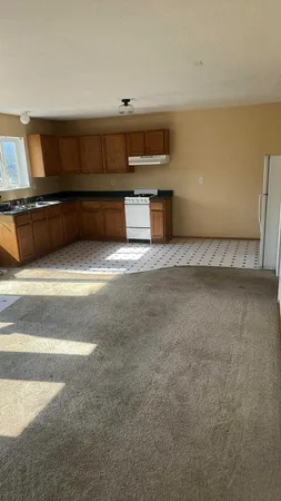 a view of kitchen and microwave