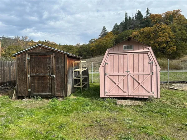 a view of backyard with green space