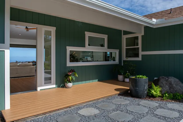 a bedroom with a bed and a book shelf