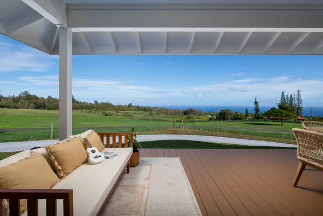 a view of swimming pool with a yard and outdoor seating