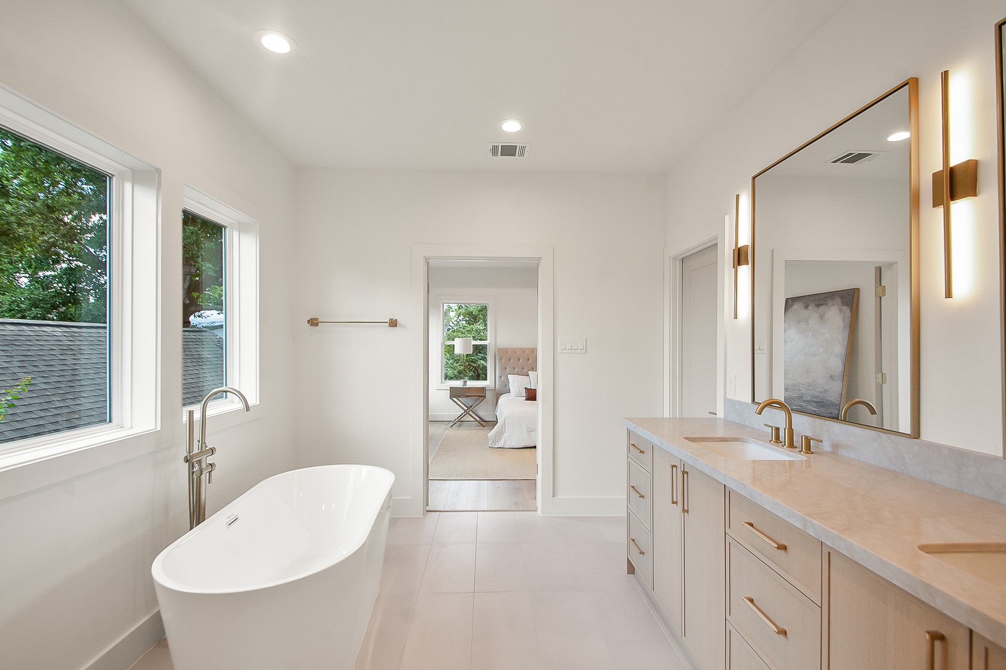 1109 Tabor Street Houston, TX 77009 - Photo 20 of 38 a bathroom with a double vanity sink and a mirror