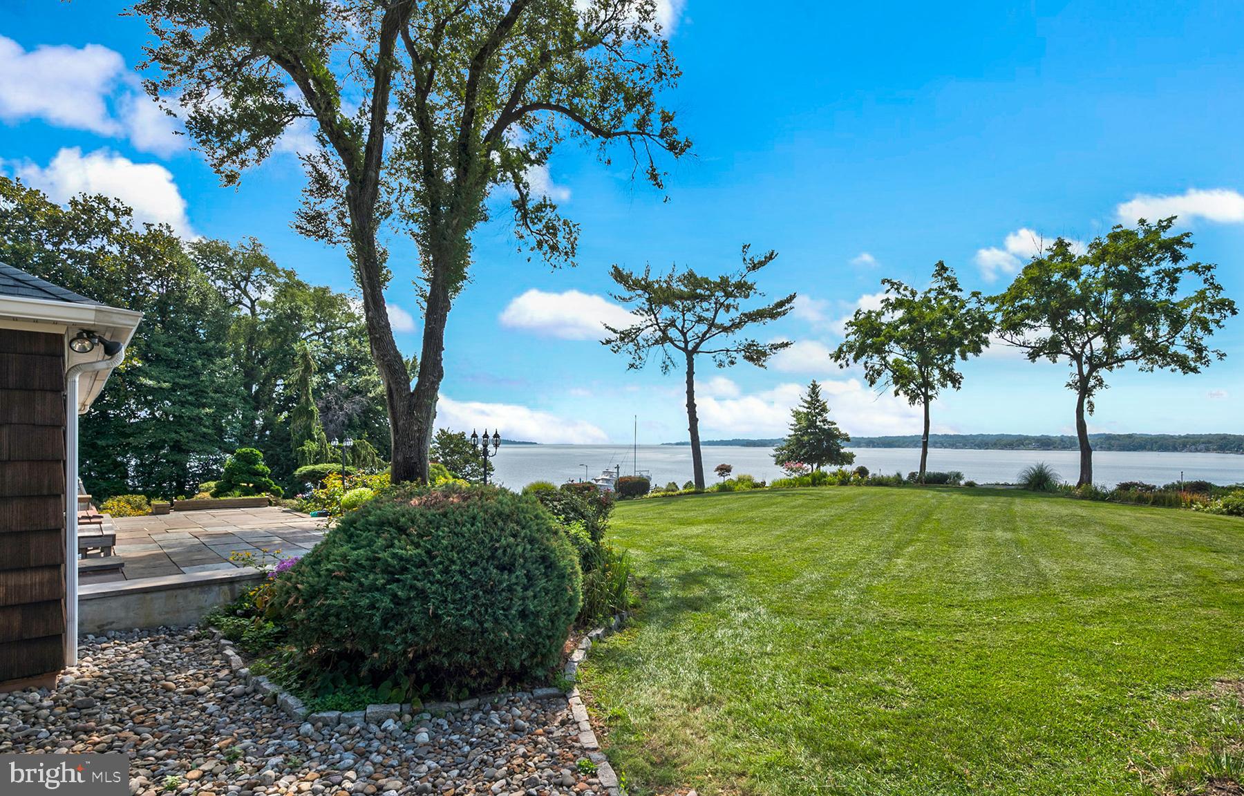 371 North Ferry Point Road Pasadena, MD 21122 - Photo 22 of 50 View from the side yard to the water