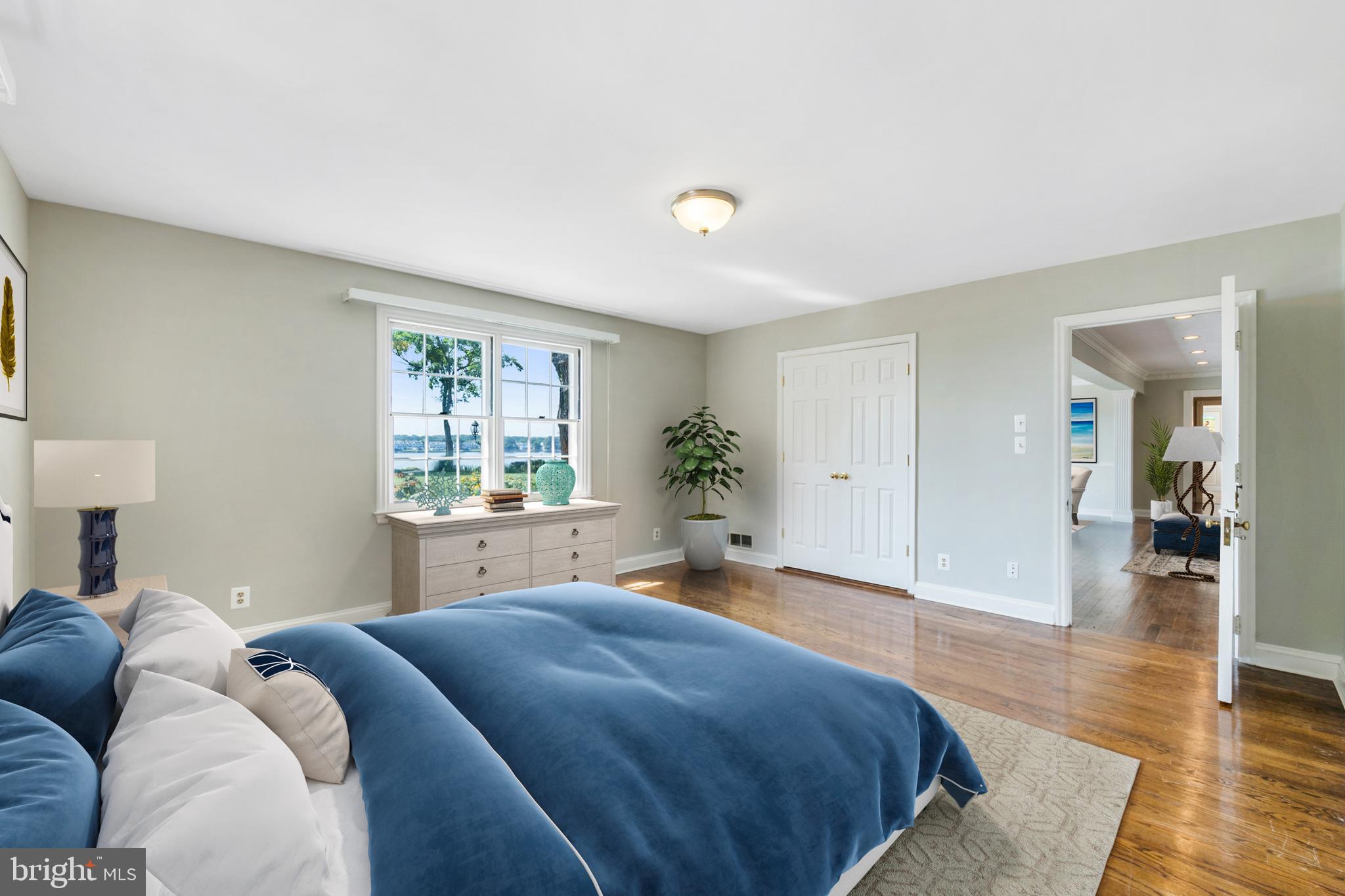 371 North Ferry Point Road Pasadena, MD 21122 - Photo 23 of 50 Primary bedroom has water views and wood floors