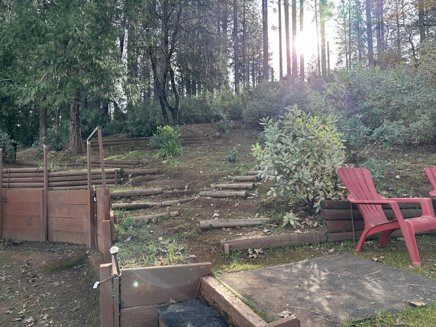 3353 Airport Road Placerville, CA 95667 - Photo 7 of 7 a backyard of a house with table and chairs