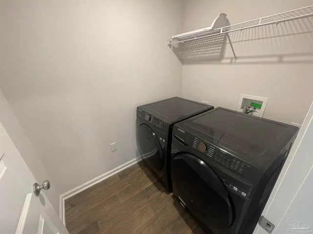 a utility room with dryer and washer