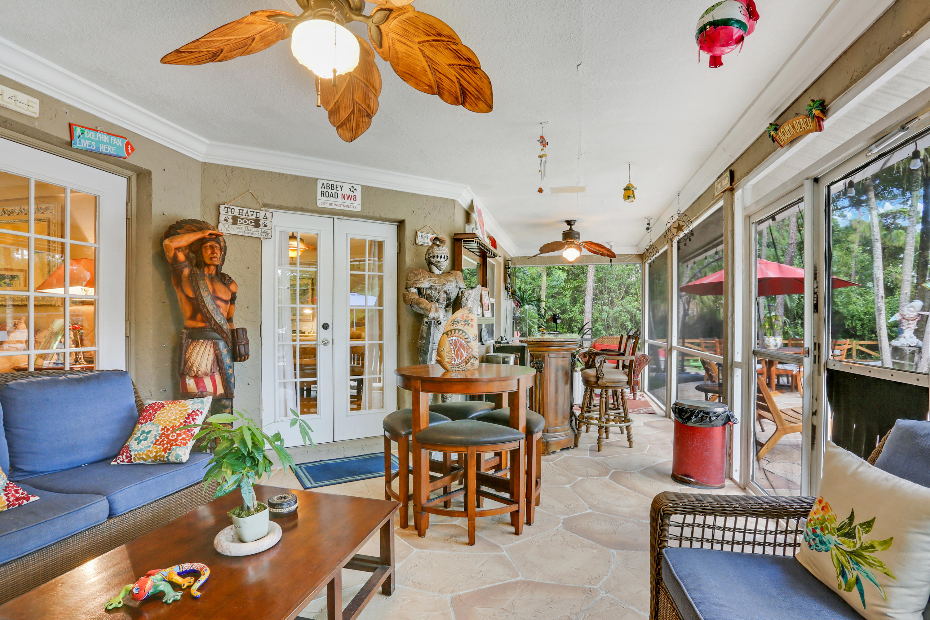 18604 43rd Road North Loxahatchee, FL 33470 - Photo 23 of 40 a living room with patio area