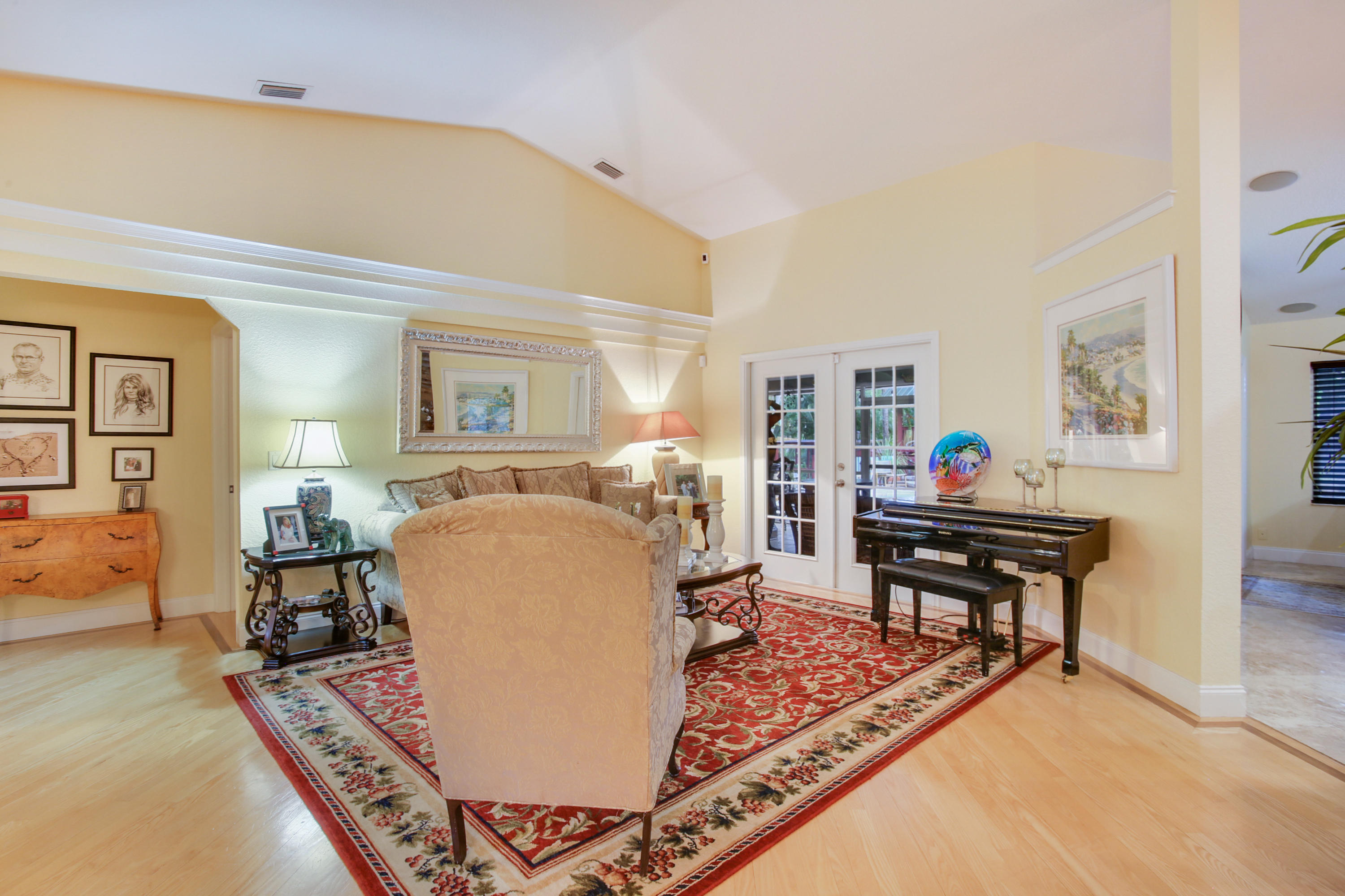 18604 43rd Road North Loxahatchee, FL 33470 - Photo 25 of 40 a living room with furniture and a wooden floor