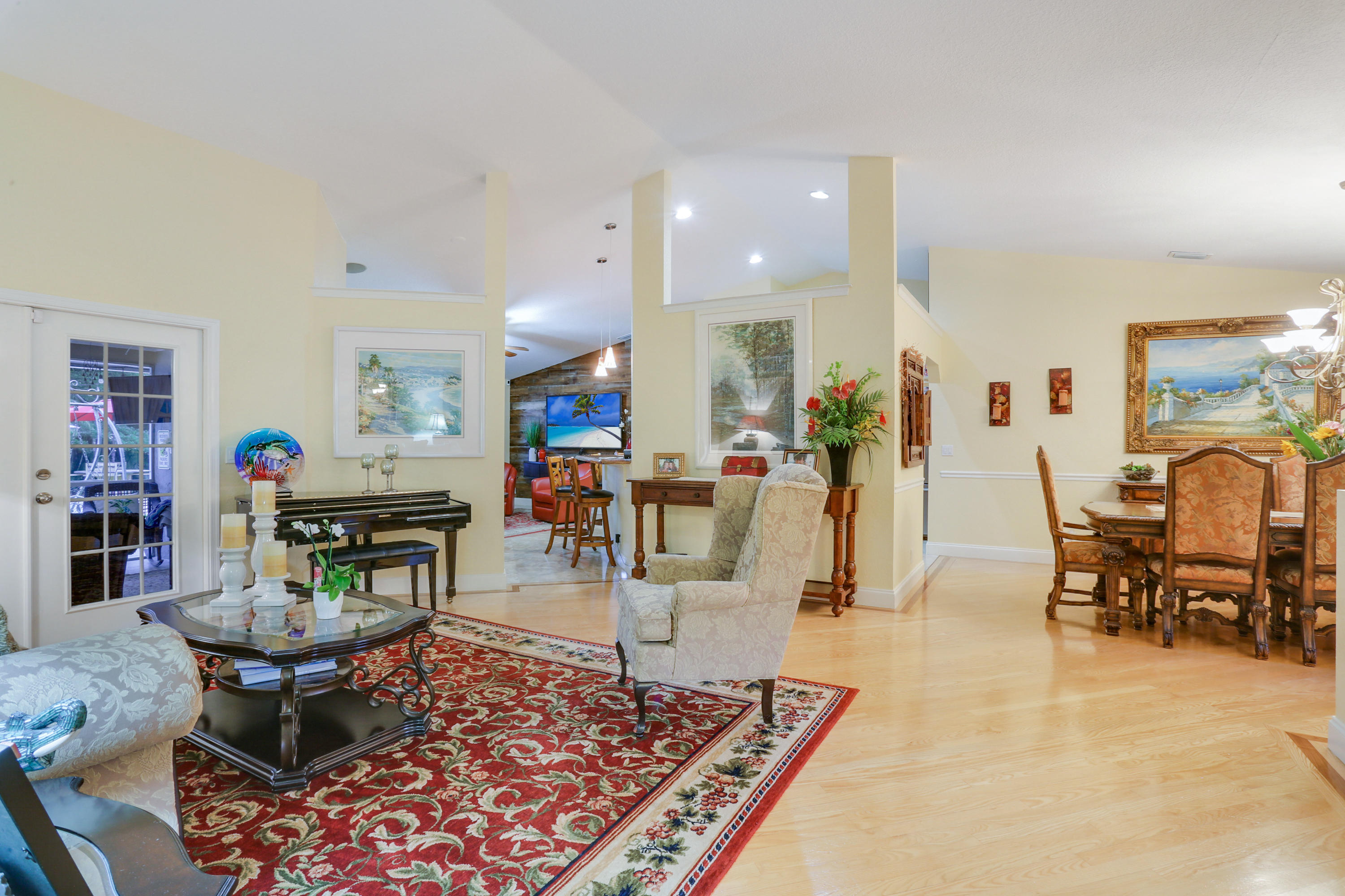 18604 43rd Road North Loxahatchee, FL 33470 - Photo 26 of 40 a living room with furniture a rug and a table