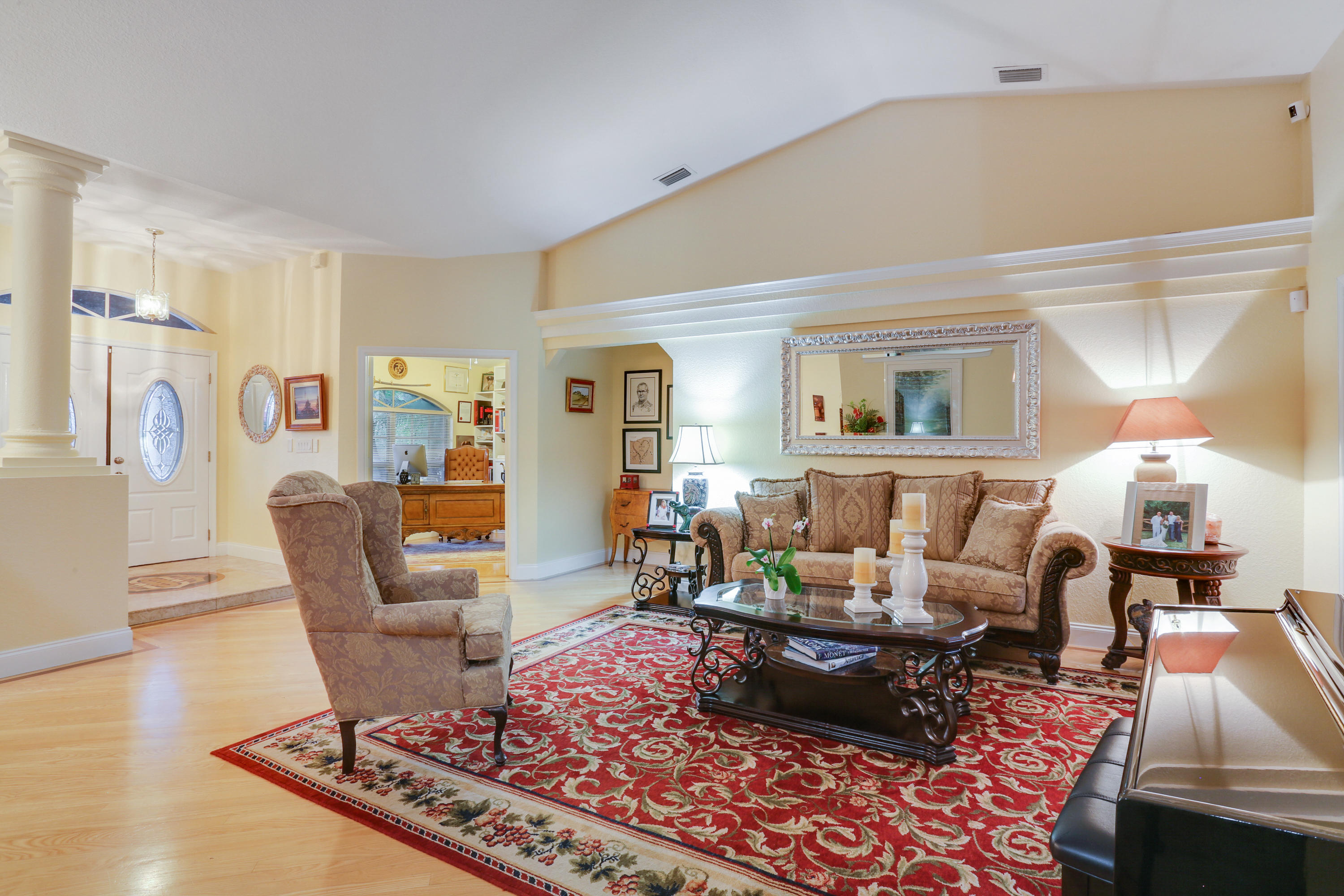 18604 43rd Road North Loxahatchee, FL 33470 - Photo 38 of 40 a living room with furniture and a lamp