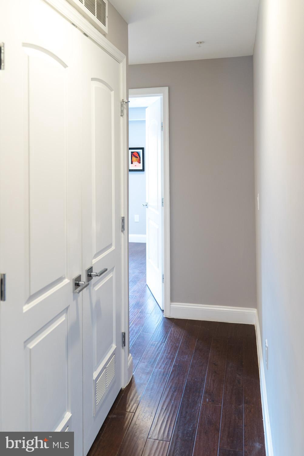 1823 D Street Northeast, Unit B Washington, DC 20002 - Photo 16 of 27 a view of an empty room with wooden floor