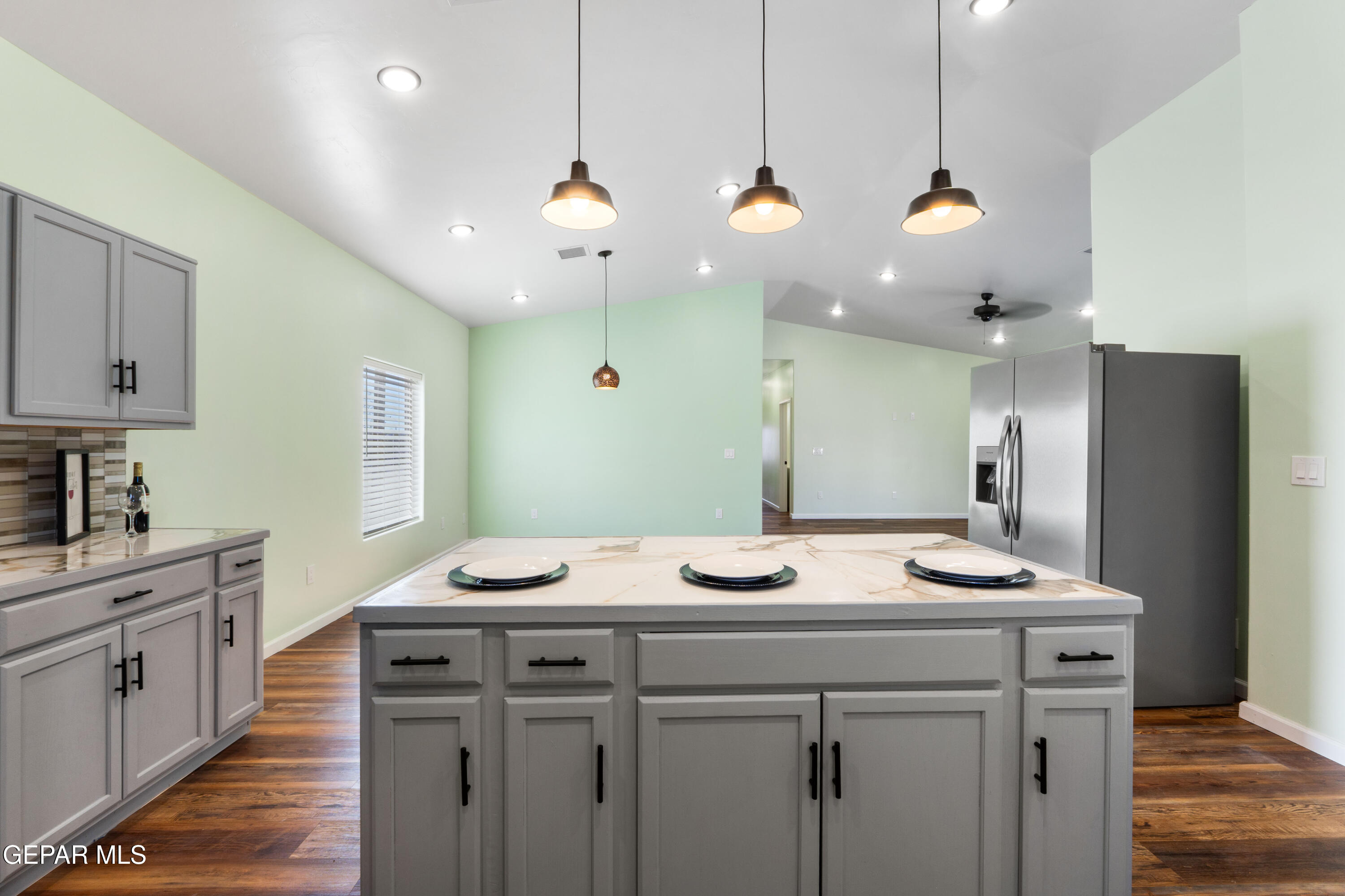 646 Snow Road, Unit 2 Las Cruces, NM 88005 - Photo 22 of 41 a kitchen with a sink a counter space and appliances