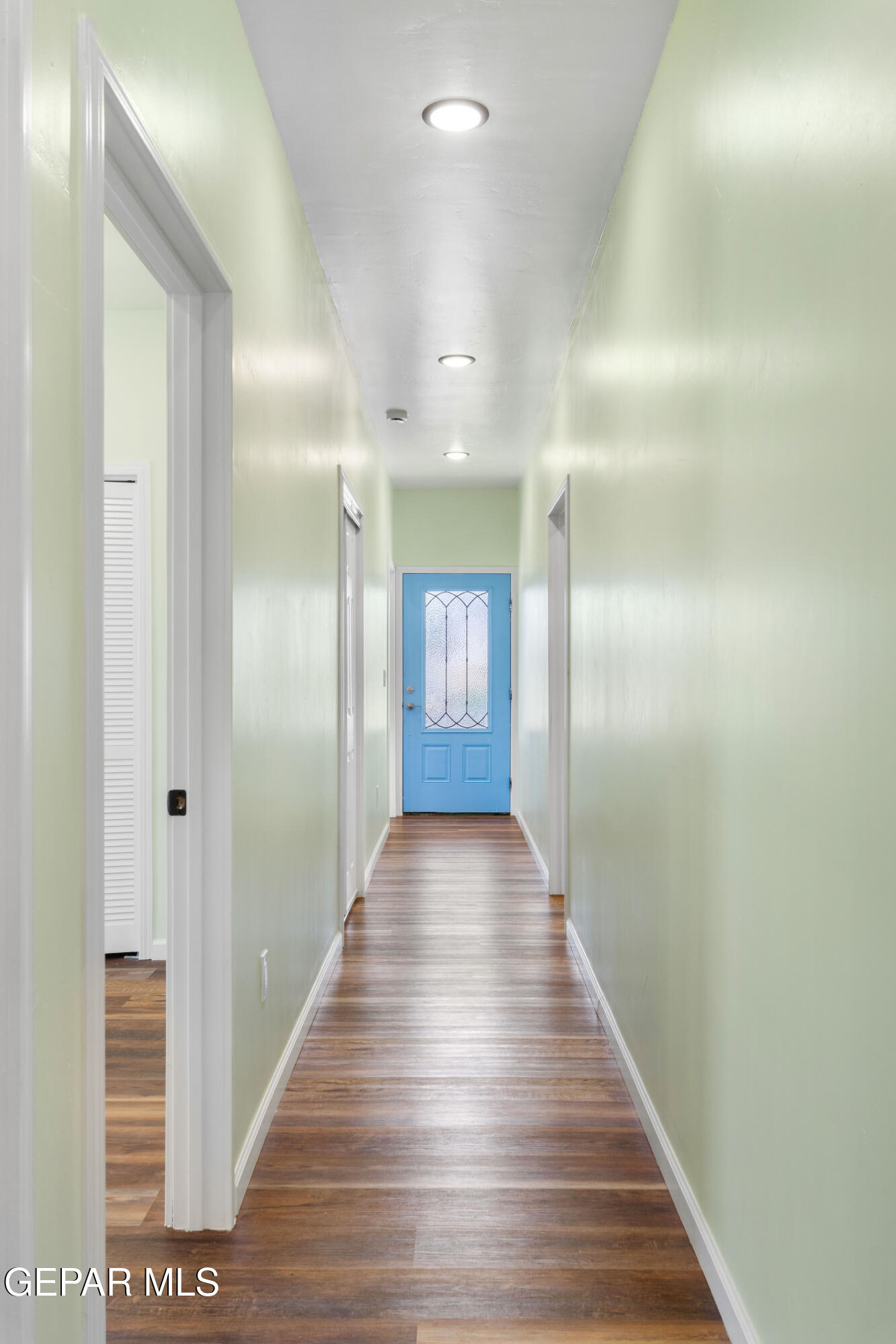 646 Snow Road, Unit 2 Las Cruces, NM 88005 - Photo 23 of 41 a view of gallery with wooden floor