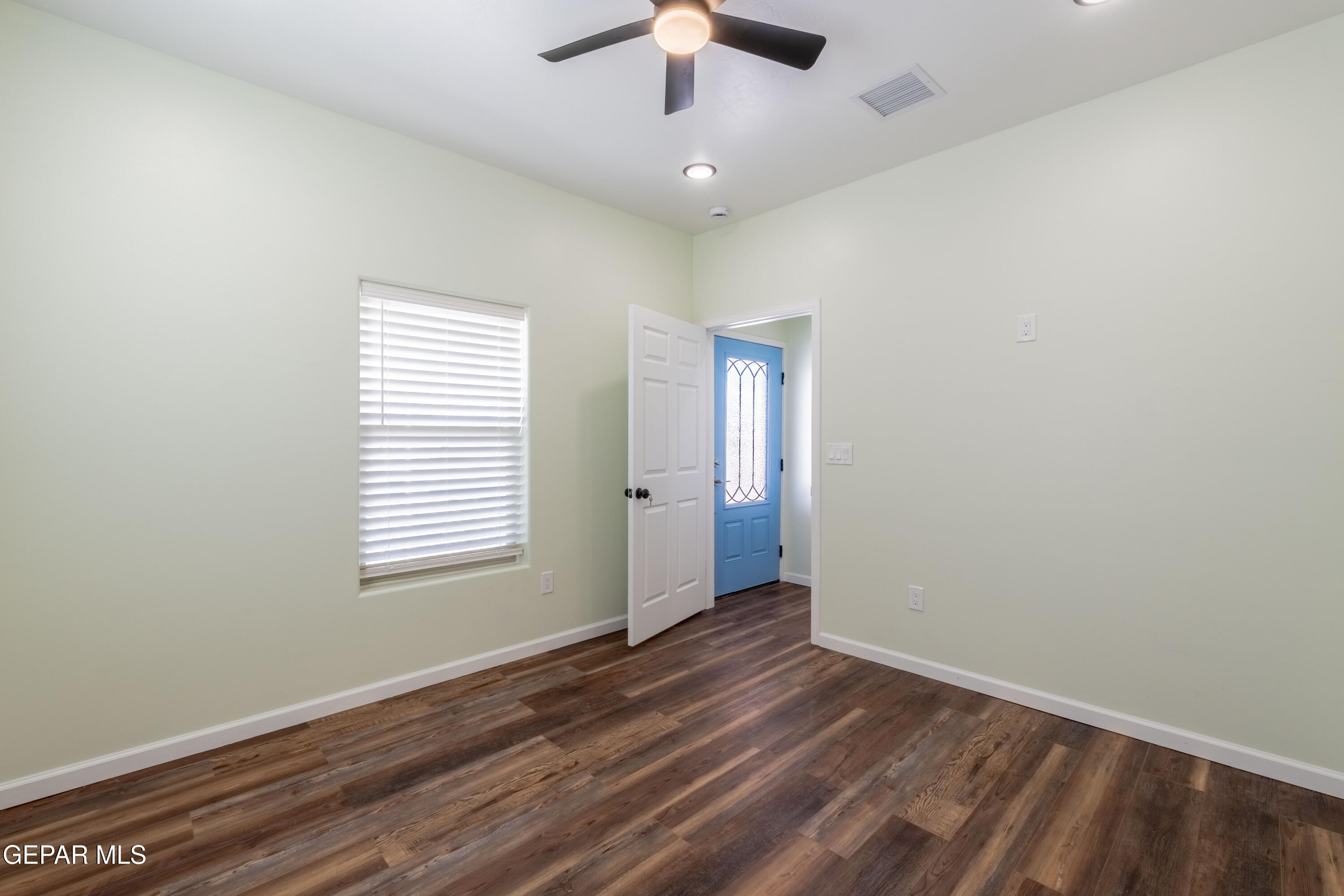 646 Snow Road, Unit 2 Las Cruces, NM 88005 - Photo 29 of 41 wooden floor in an empty room with a window