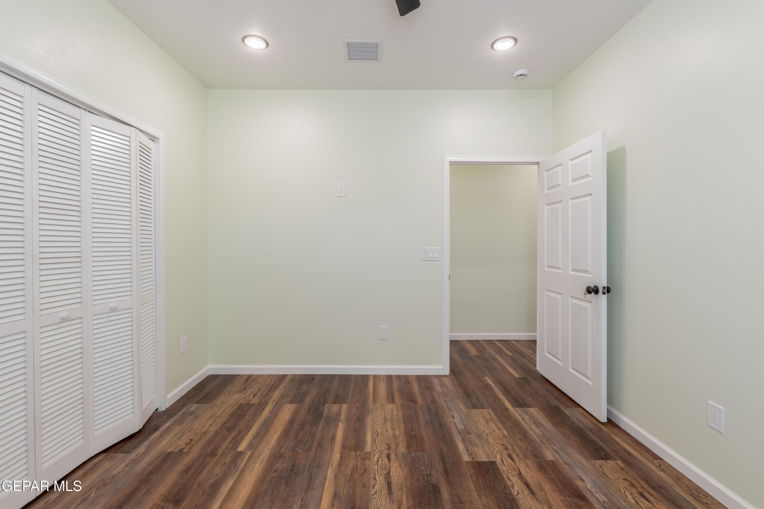 646 Snow Road, Unit 2 Las Cruces, NM 88005 - Photo 33 of 41 a view of a room with wooden floor