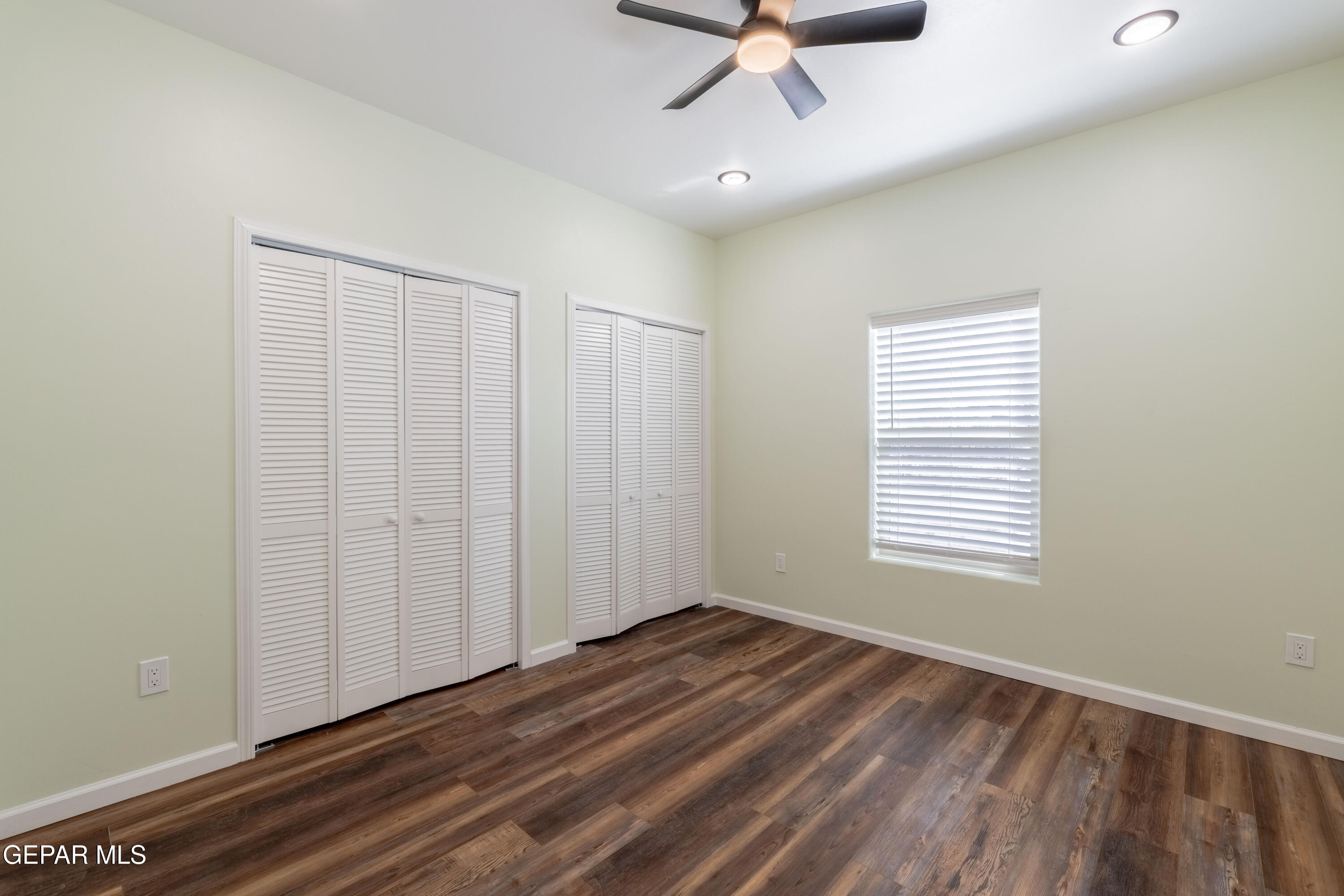 646 Snow Road, Unit 2 Las Cruces, NM 88005 - Photo 34 of 41 wooden floor in an empty room with a window