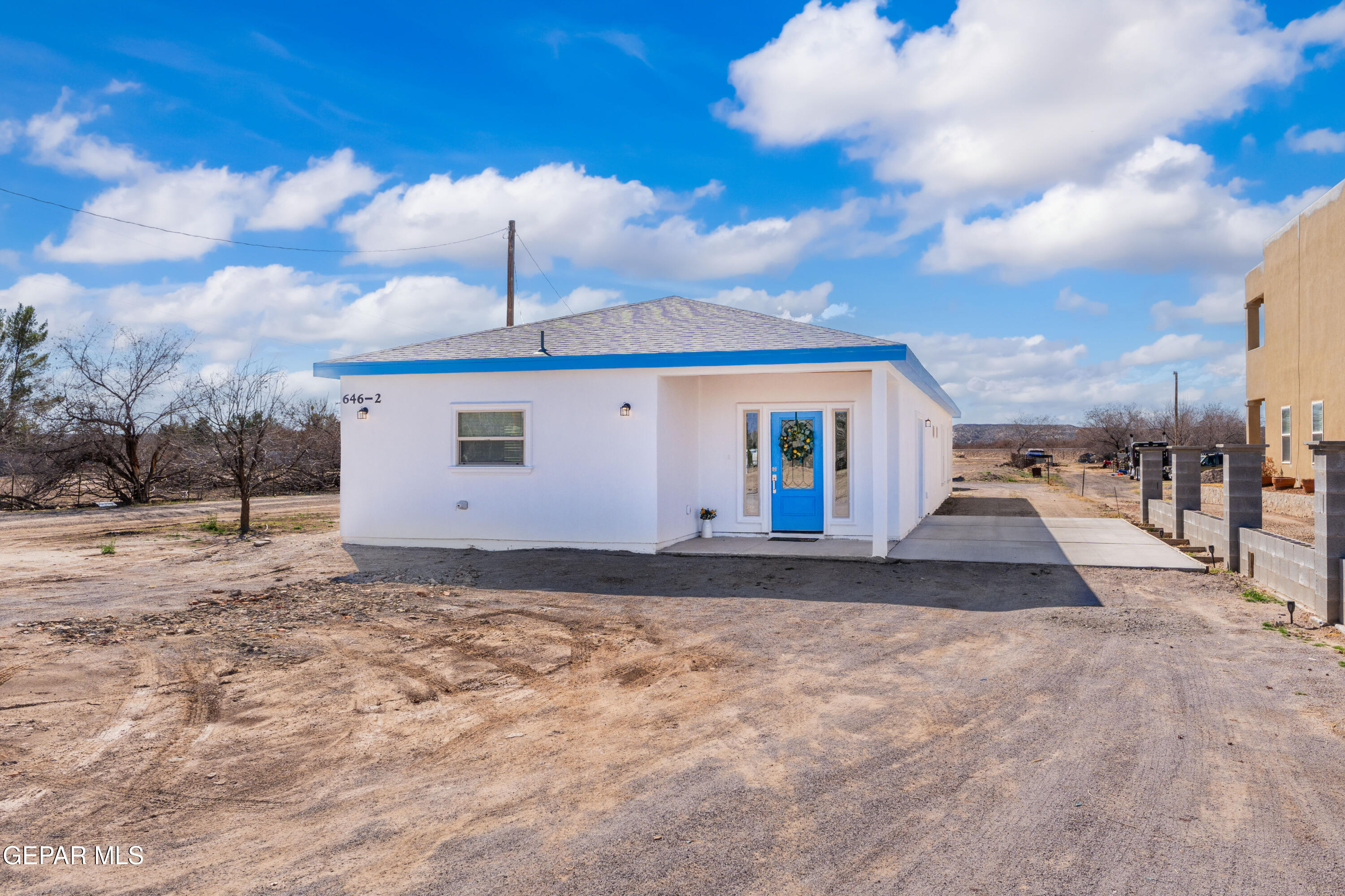 646 Snow Road, Unit 2 Las Cruces, NM 88005 - Photo 38 of 41 a view of a house with a yard