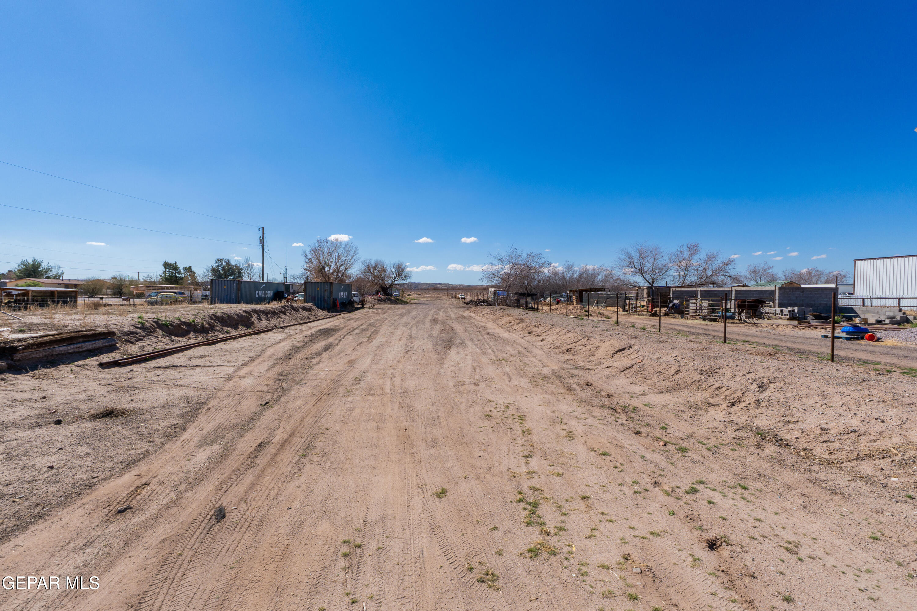 646 Snow Road, Unit 2 Las Cruces, NM 88005 - Photo 41 of 41 a view of a dry yard with trees