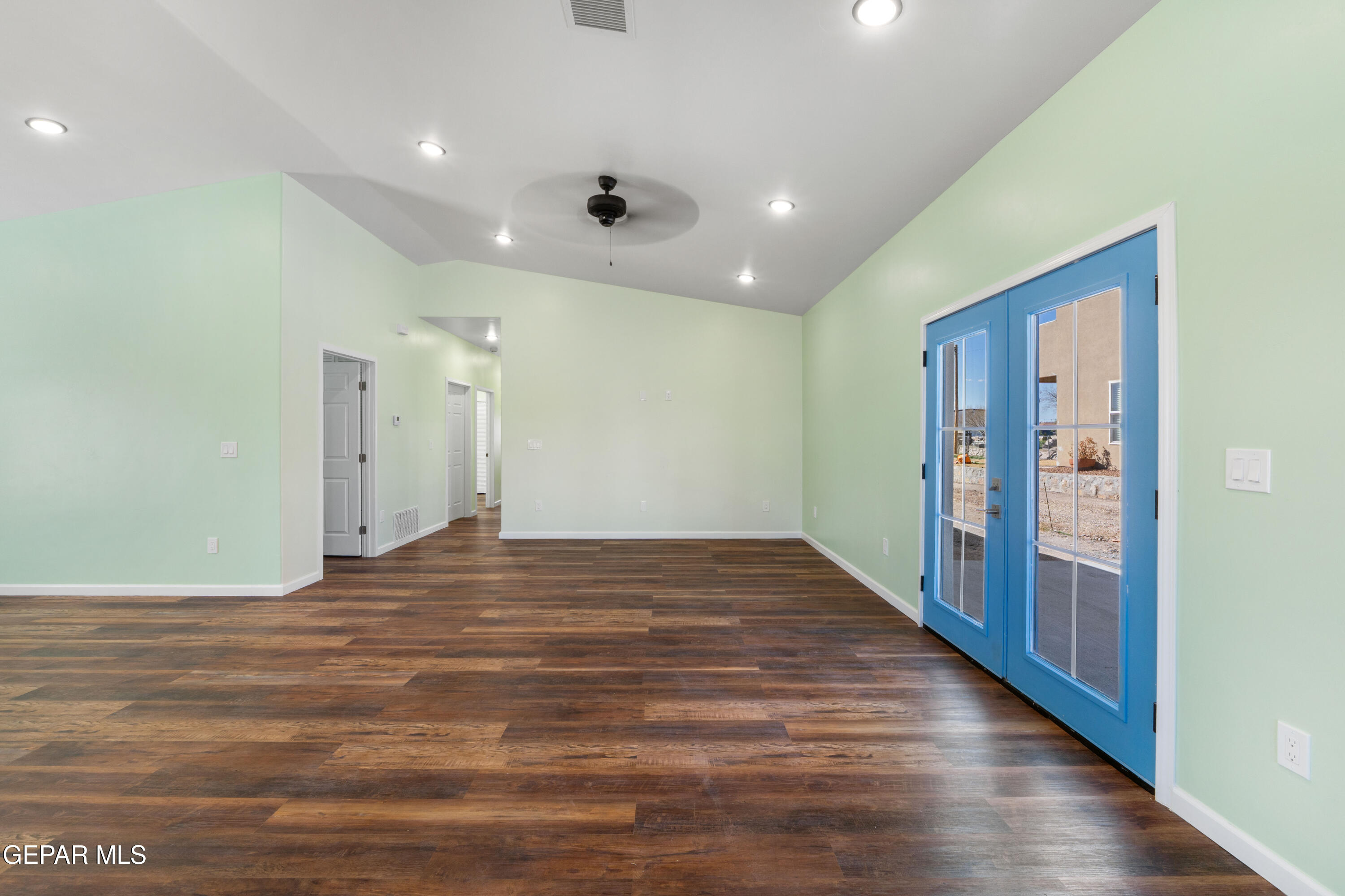646 Snow Road, Unit 2 Las Cruces, NM 88005 - Photo 8 of 41 a view of a hallway with wooden floor