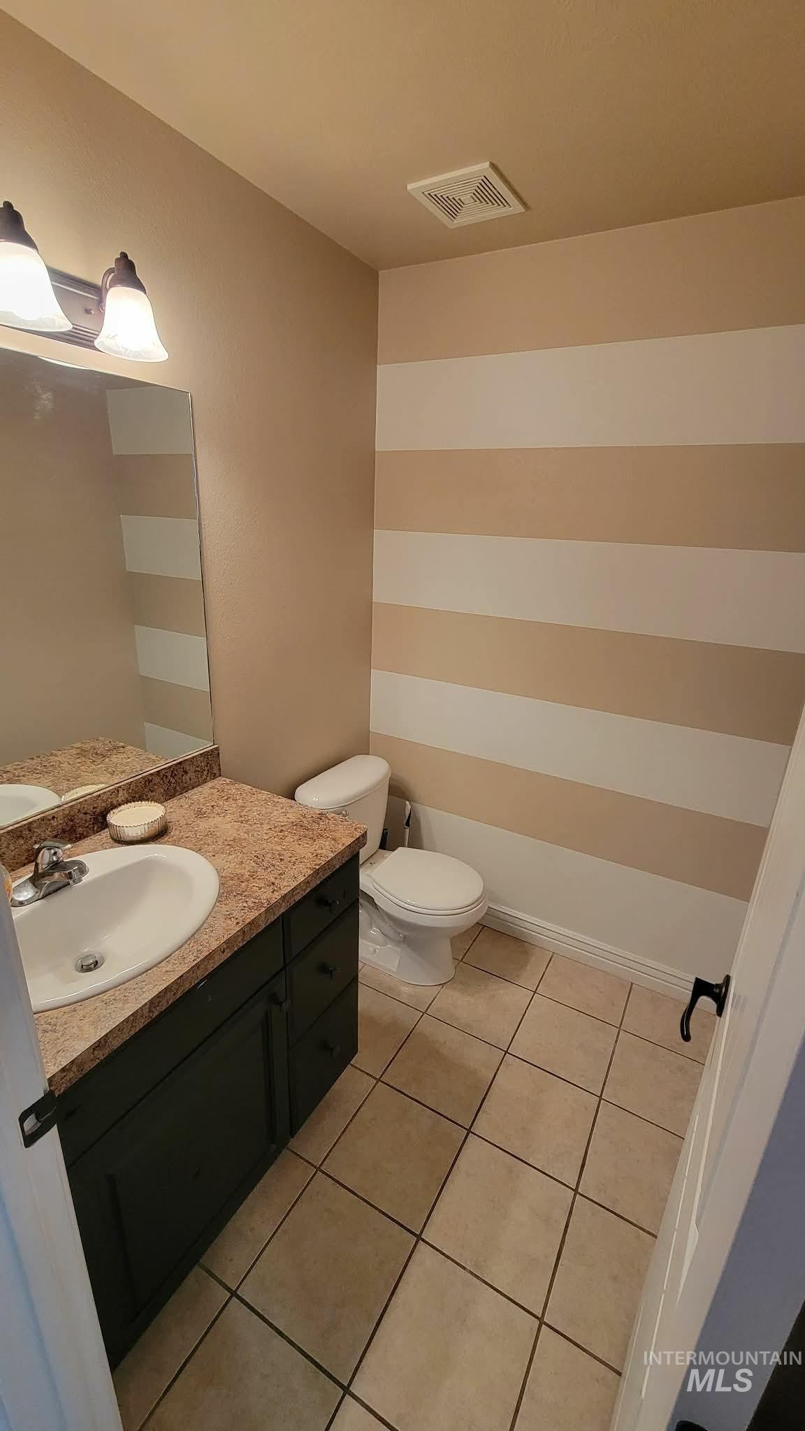 470 Sunflower Road Rexburg, ID 83440 - Photo 7 of 16 Bathroom with vanity and light tile patterned floors