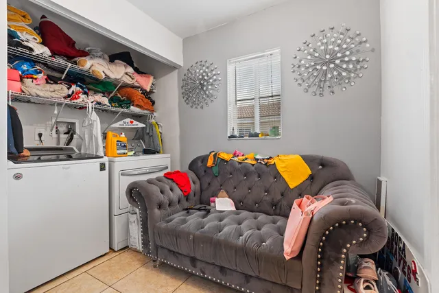 a living room with furniture and a couch