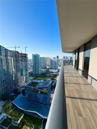 a view of a balcony with chairs