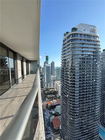 a view of a balcony with city view