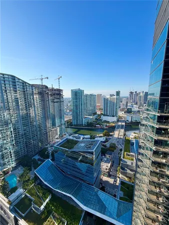 a view of a balcony with chairs